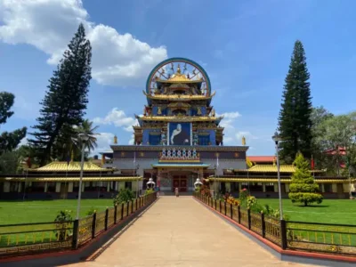 "Namdroling Monastery in Coorg, famous Tibetan Golden Temple with colorful architecture and peaceful surroundings"